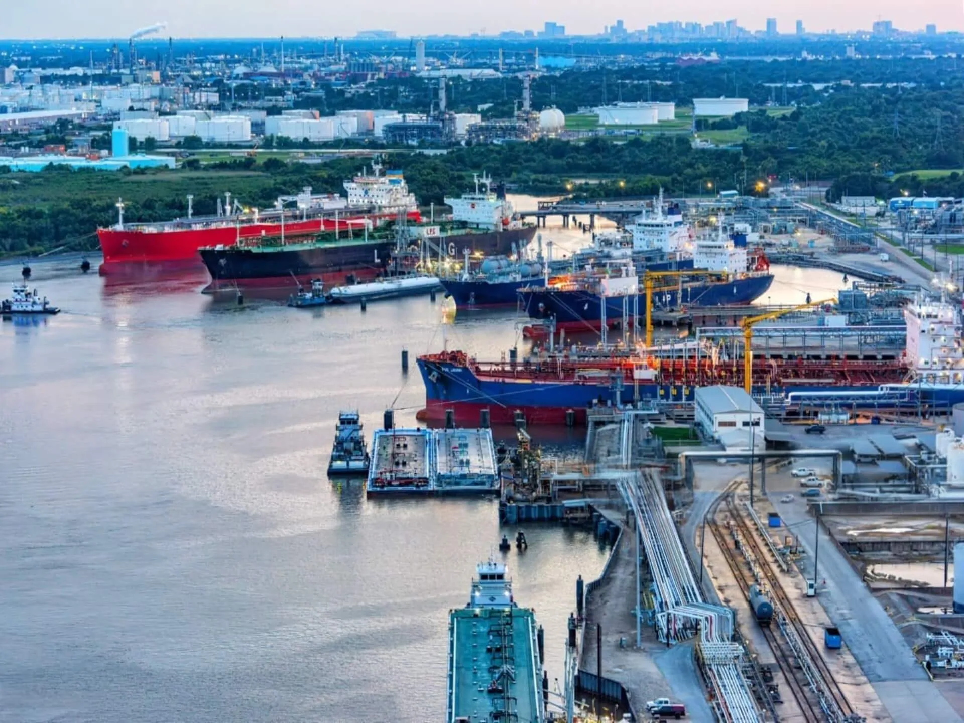 Commercial ships moored in a harbor.